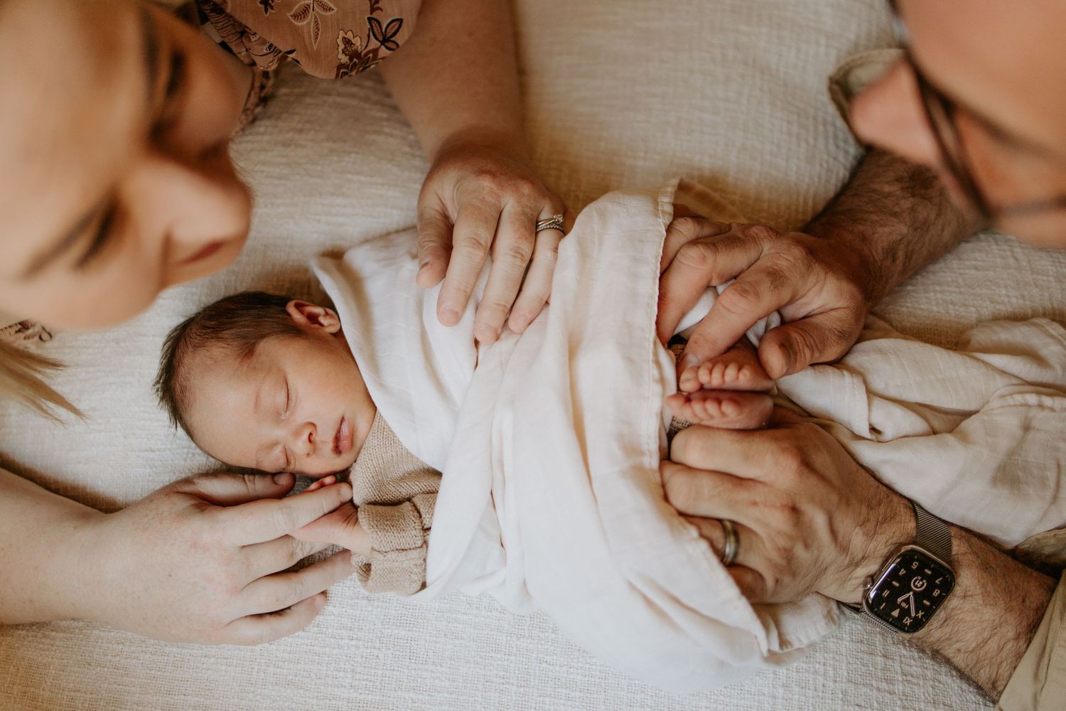 Adelaide newborn photographer - Parents loving their newborn baby girl