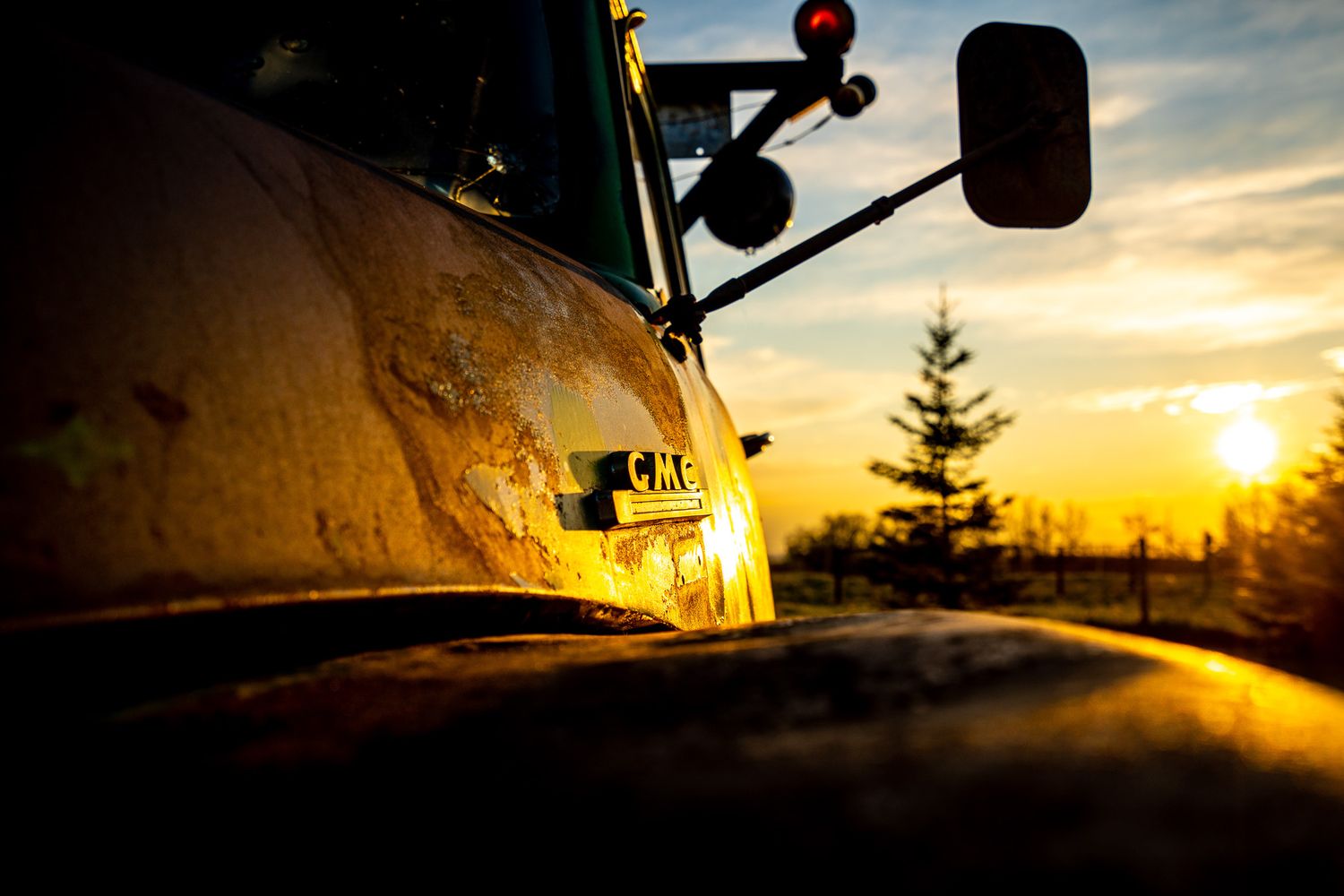 Sunset behind 1950's GMC Truck.
