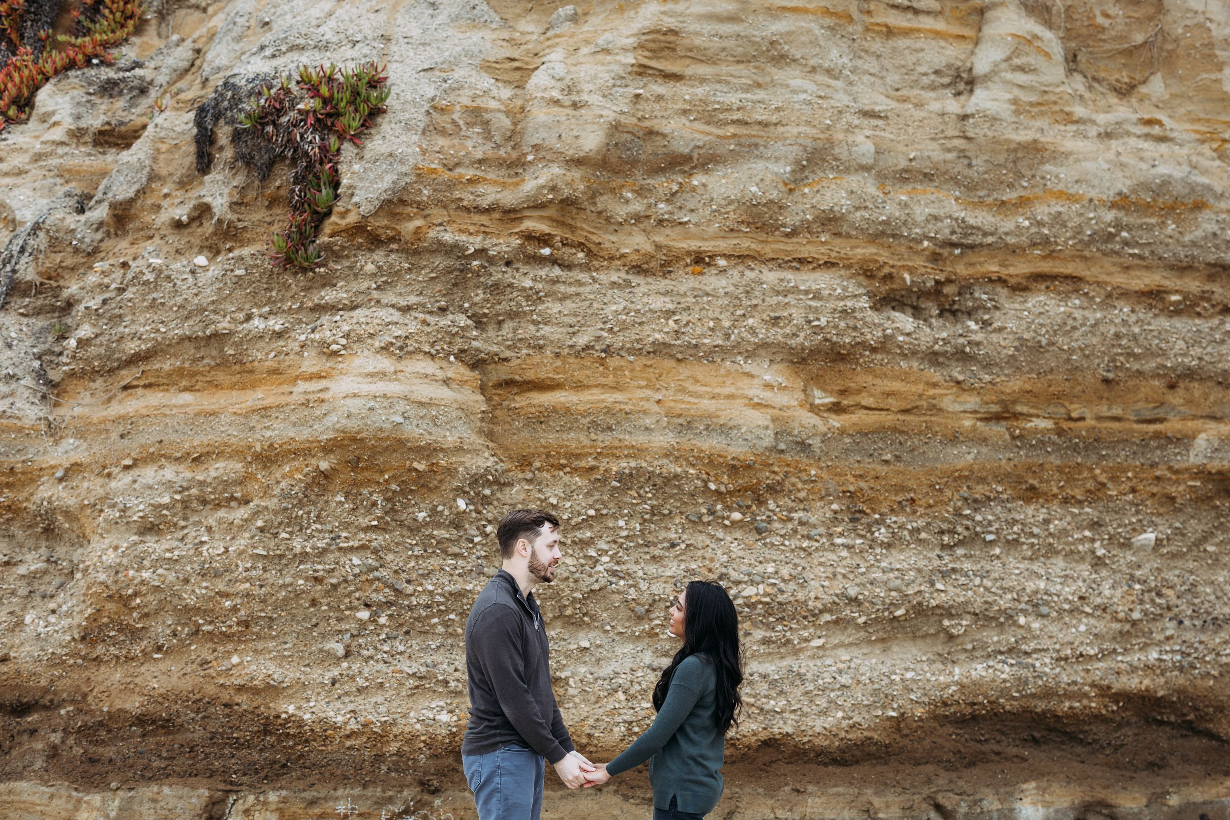 Half Moon Bay cliffside engagement photo