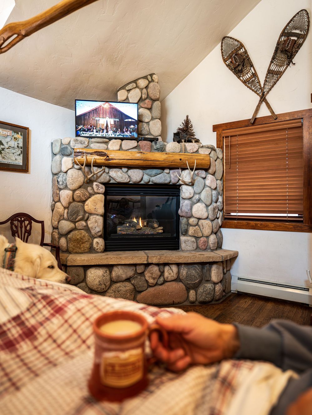 Shot of a coffee cup and fire place at the Minturn Inn by Denver Hospitality, Travel & Tourism photographer Captain Colorado Photography.