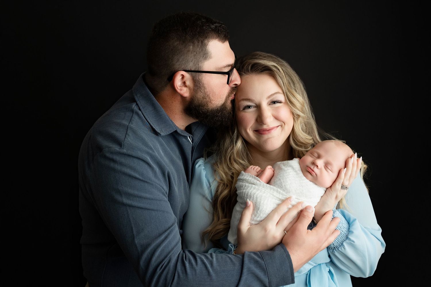 Mom and dad holding newborn. Greenville sc newborn photographer, Easley sc newborn photographer, Greenville sc newborn photos