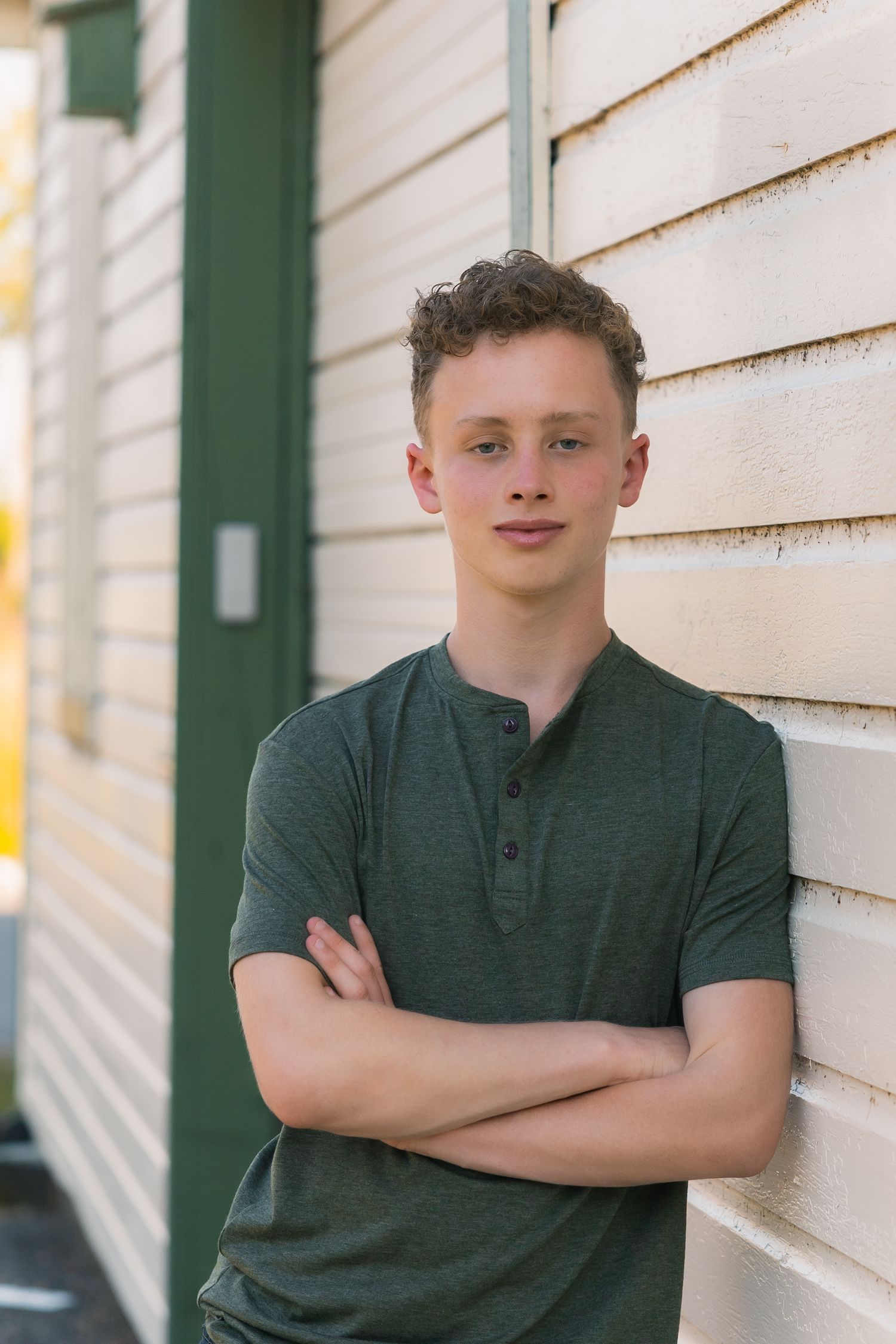 lake kegonsa state park fish camp county boat launch senior photos location unique madison wisconsin shelter building backdrop leaning boy