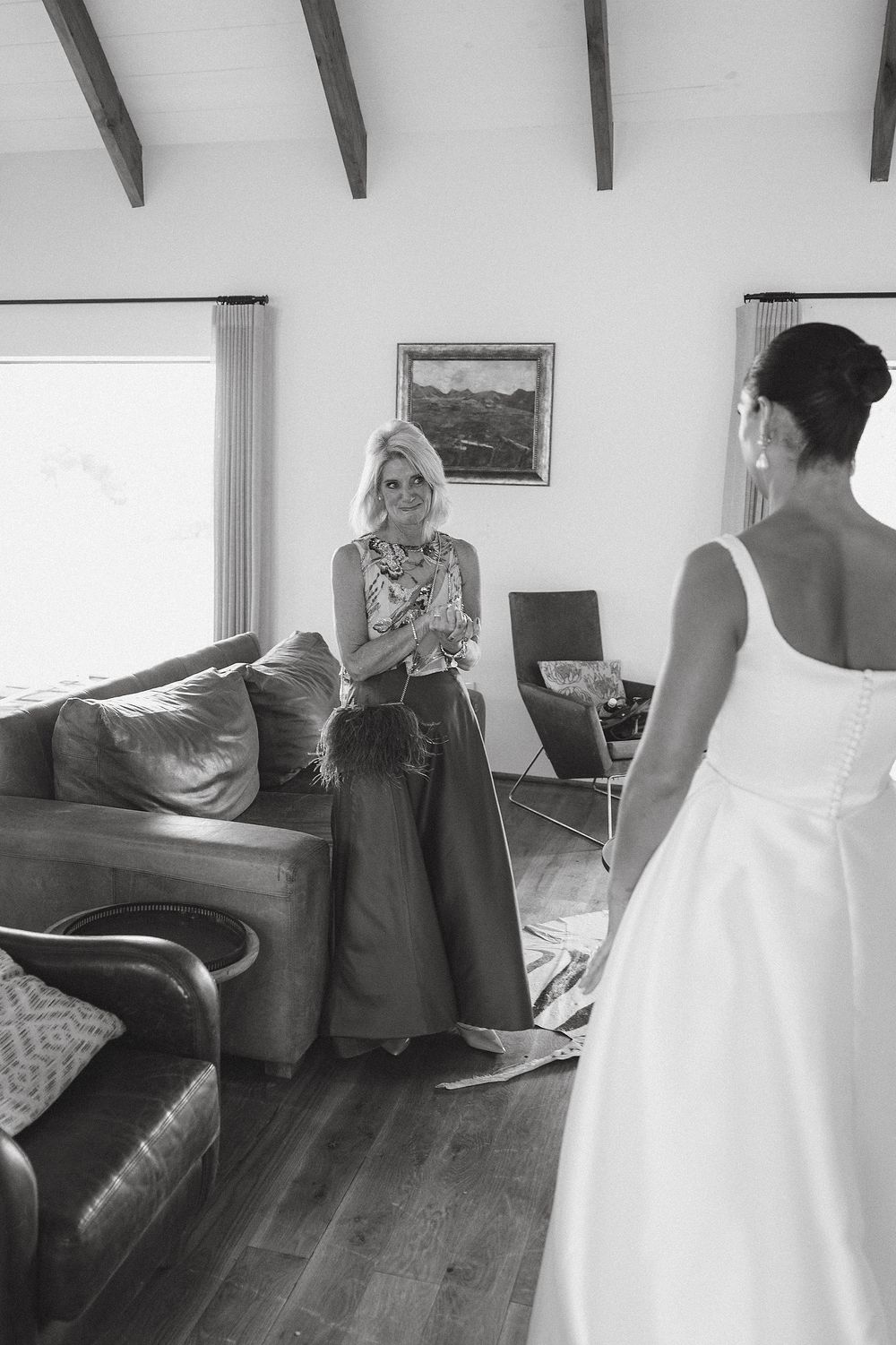 Bride Lizré getting ready in elegant wedding gown at Kleinevalleij in the Cape Winelands