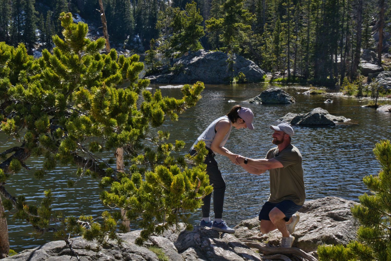 She can't believe he just dropped to one knee to propose at Dream Lake in RMNP. Pixcapades | The Rocky Mountain Proposal Photographer