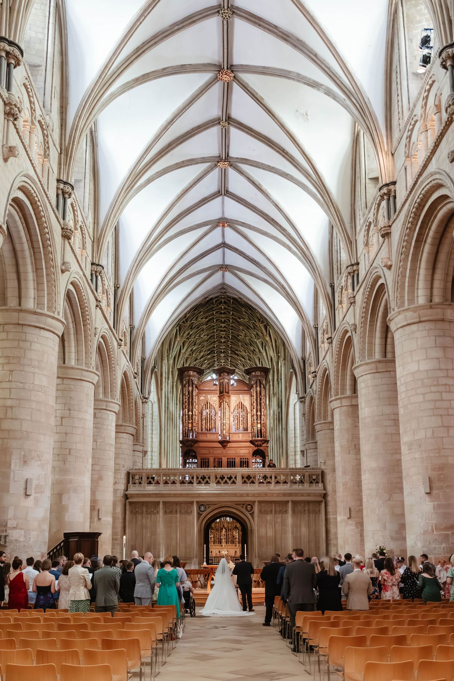 Gloucester Cathedral wedding photographer Gloucestershire Cheltenham Cotswolds Wedding ceremony in the nave