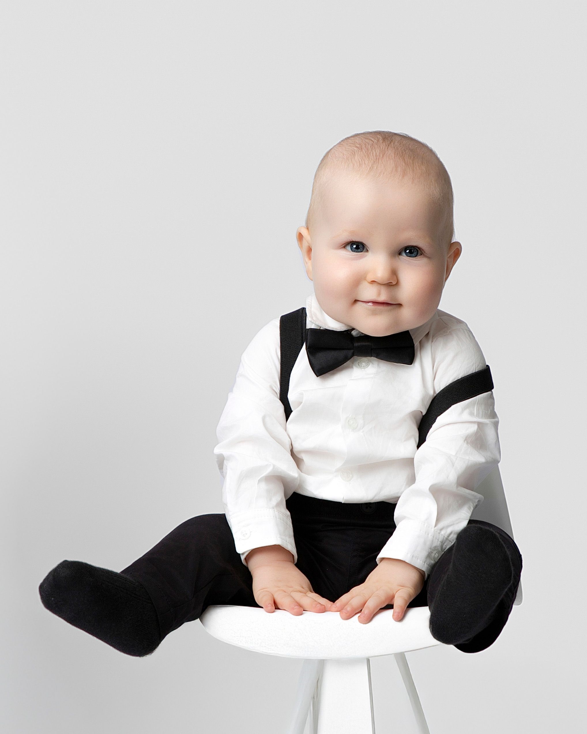 family studio portrait Sarasota white background parents with three kids and poodle clean modern timeless photography
