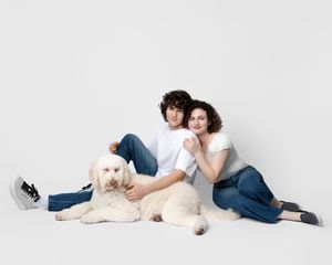 family studio portrait Sarasota white background parents with three kids and poodle clean modern timeless photography