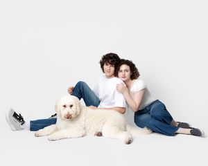 family studio portrait Sarasota white background parents with three kids and poodle clean modern timeless photography