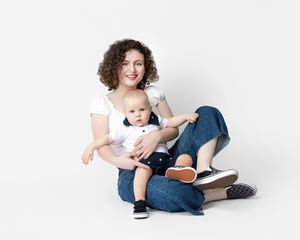 family studio portrait Sarasota white background parents with three kids and poodle clean modern timeless photography