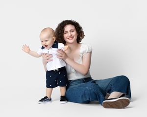 family studio portrait Sarasota white background parents with three kids and poodle clean modern timeless photography