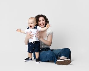 family studio portrait Sarasota white background parents with three kids and poodle clean modern timeless photography