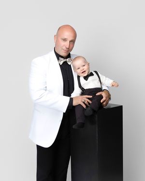 family studio portrait Sarasota white background parents with three kids and poodle clean modern timeless photography
