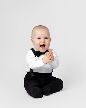 family studio portrait Sarasota white background parents with three kids and poodle clean modern timeless photography