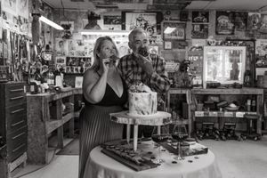 Vintage black and white photo series showing interior views of an old general store with shelves of merchandise and customers.