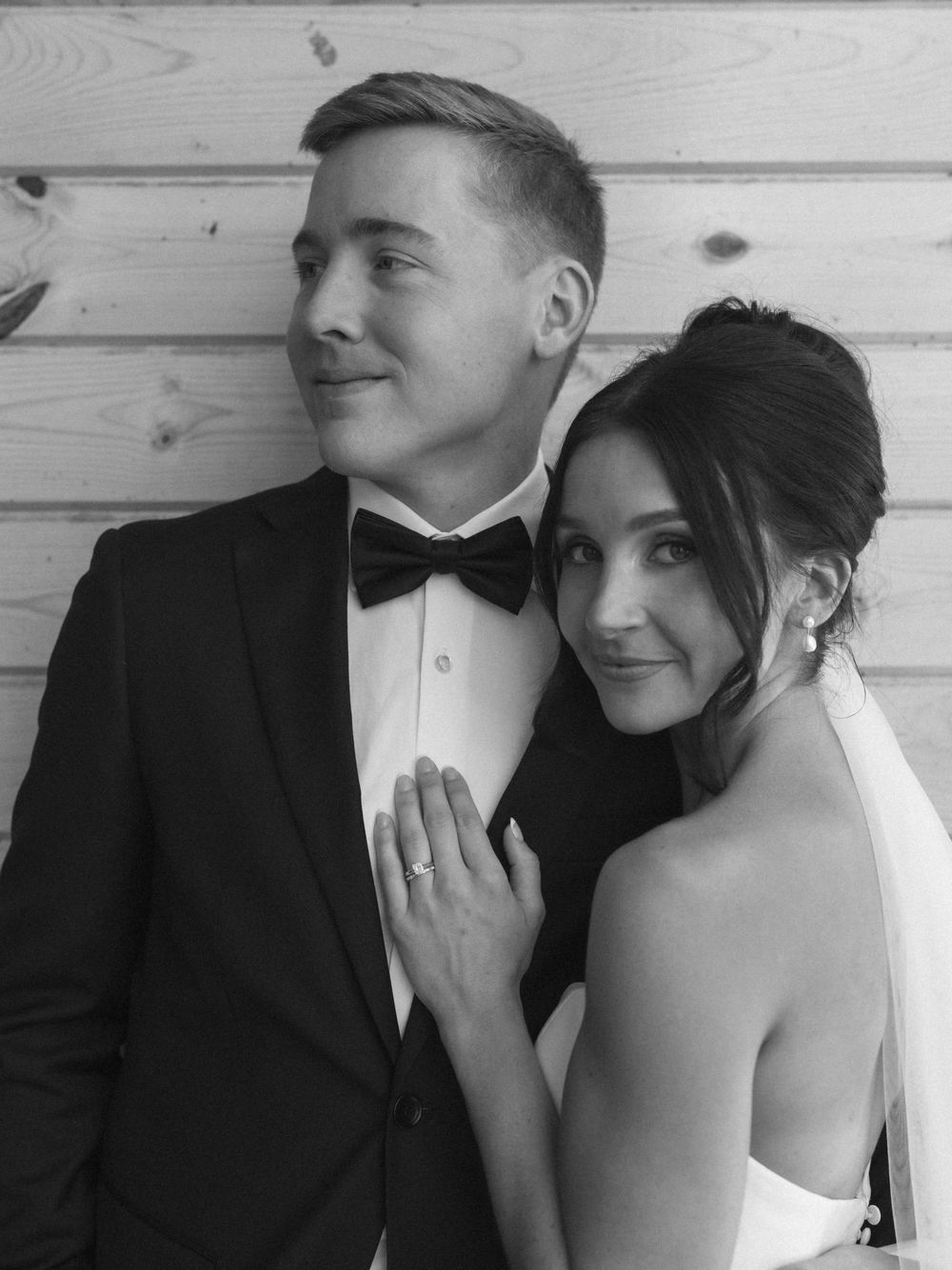 Black and white romantic wedding portrait sequence showing tender moments between newlyweds.