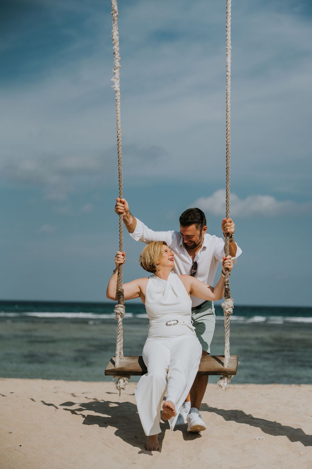 Romantic wedding anniversary photography services with ocean background