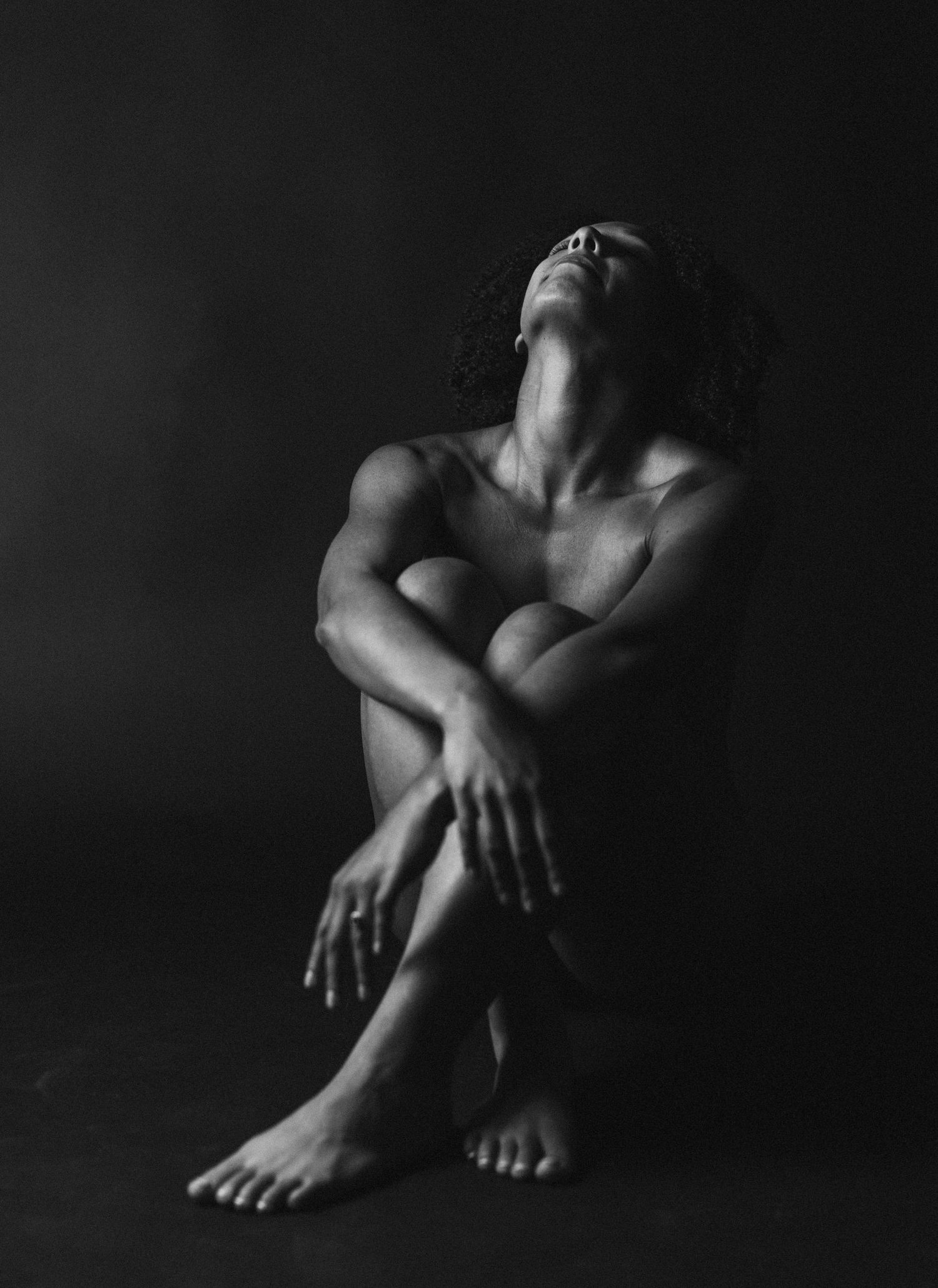 Black and white artistic photographs exploring human form and shadow.