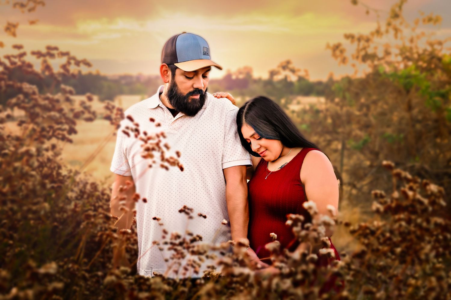 Expecting couple at Woodward Park in Fresno during golden hour maternity session, captured by Colibrí Captures.