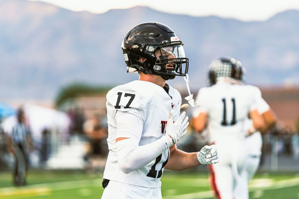 Football player running right frame