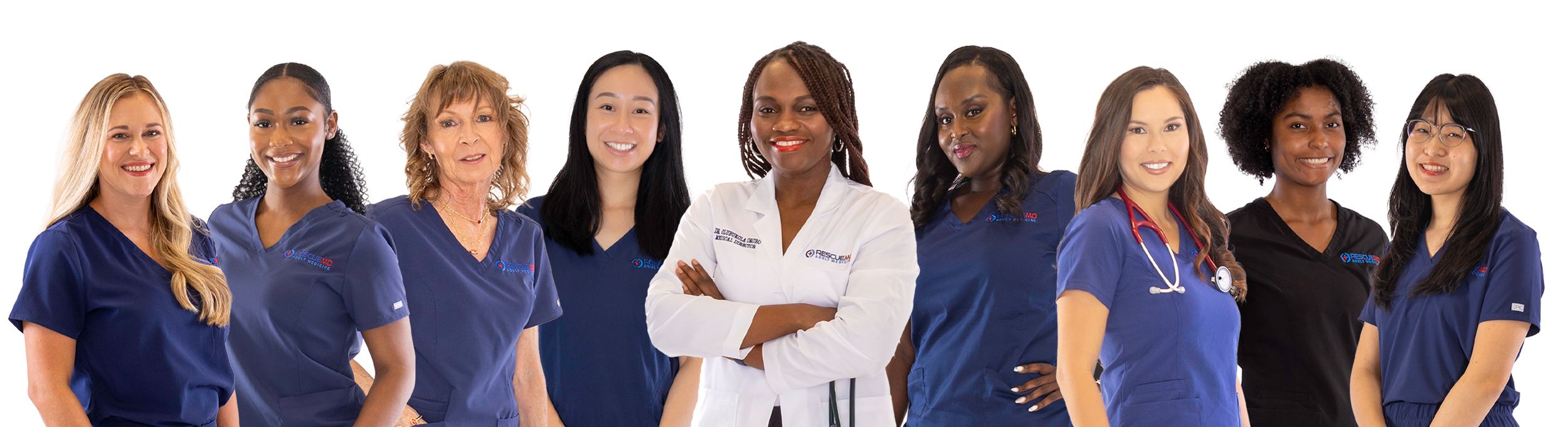 Diverse group of professionals in business attire standing together in a row against a white background.