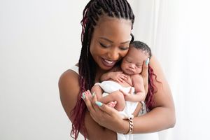 A series of tender moments between a mother and newborn baby during a professional photography session.