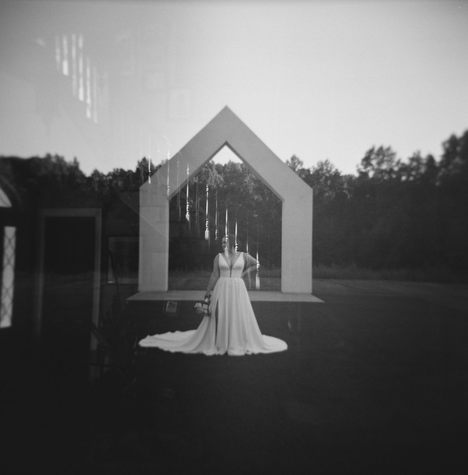 A series of black and white photos showing a wedding dress silhouette against a rustic outdoor backdrop.