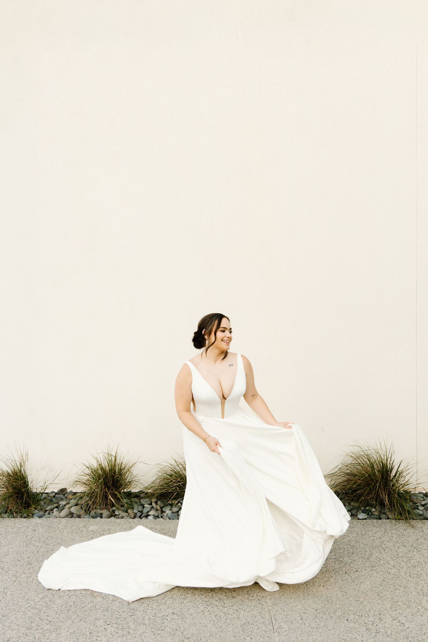 A series of artistic bridal portraits showing flowing white dress movement against a minimalist outdoor backdrop.