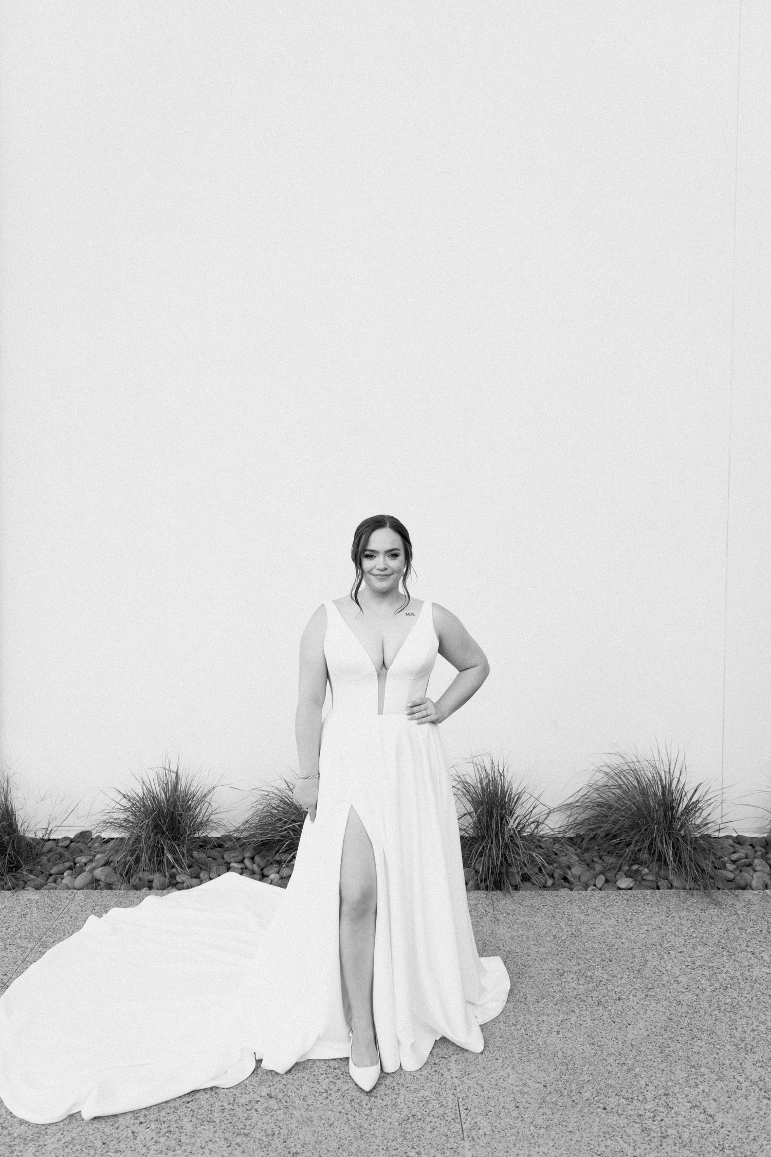 Black and white series of bridal portraits showcasing elegant poses against a simple white background.