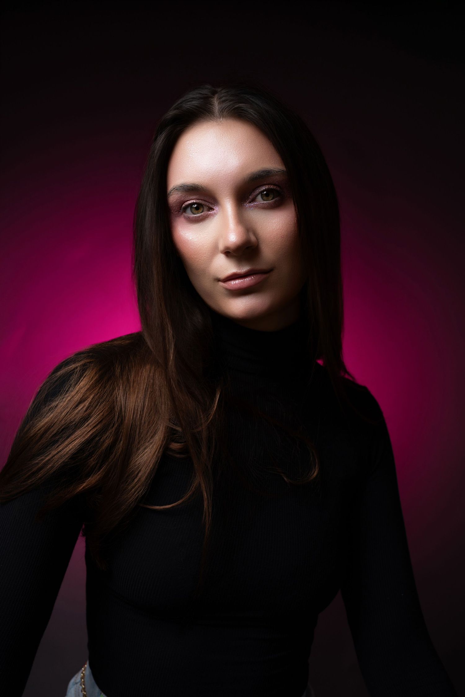 Dramatic fashion portrait series with moody lighting showing different poses against pink and black backdrop.
