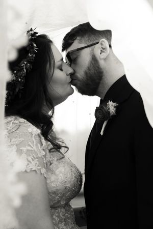 Black & White Bride & Groom with Veil Wedding Photo taken at White Chapel Farm and Venue in Hillsville, VA.