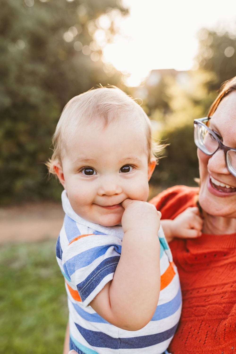 Close-up series showing joyful expressions and interactions during an outdoor family photoshoot at sunset.