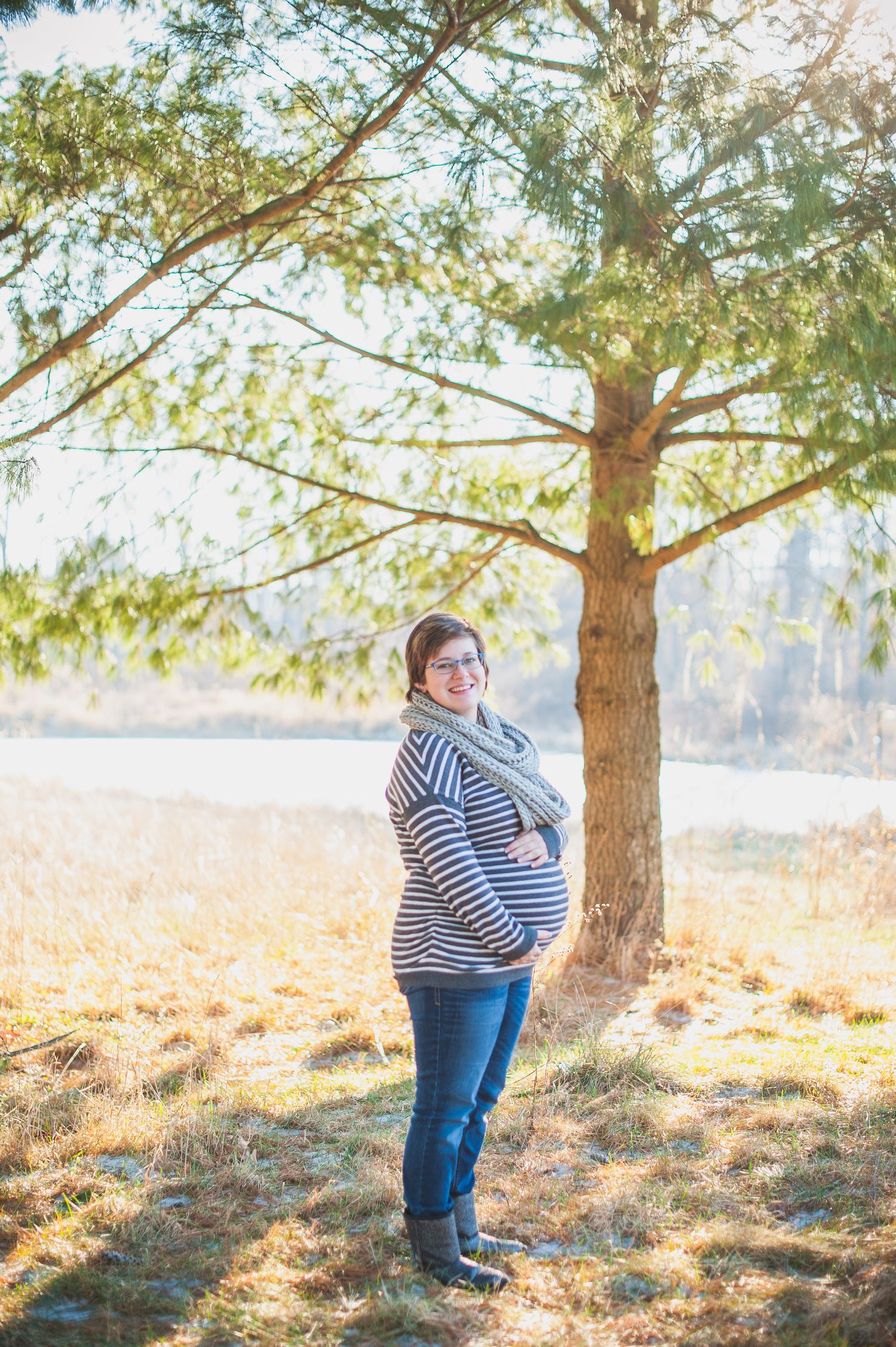 Four sequential photos under pine trees show a person in stripes and jeans enjoying a sunny autumn day in nature.