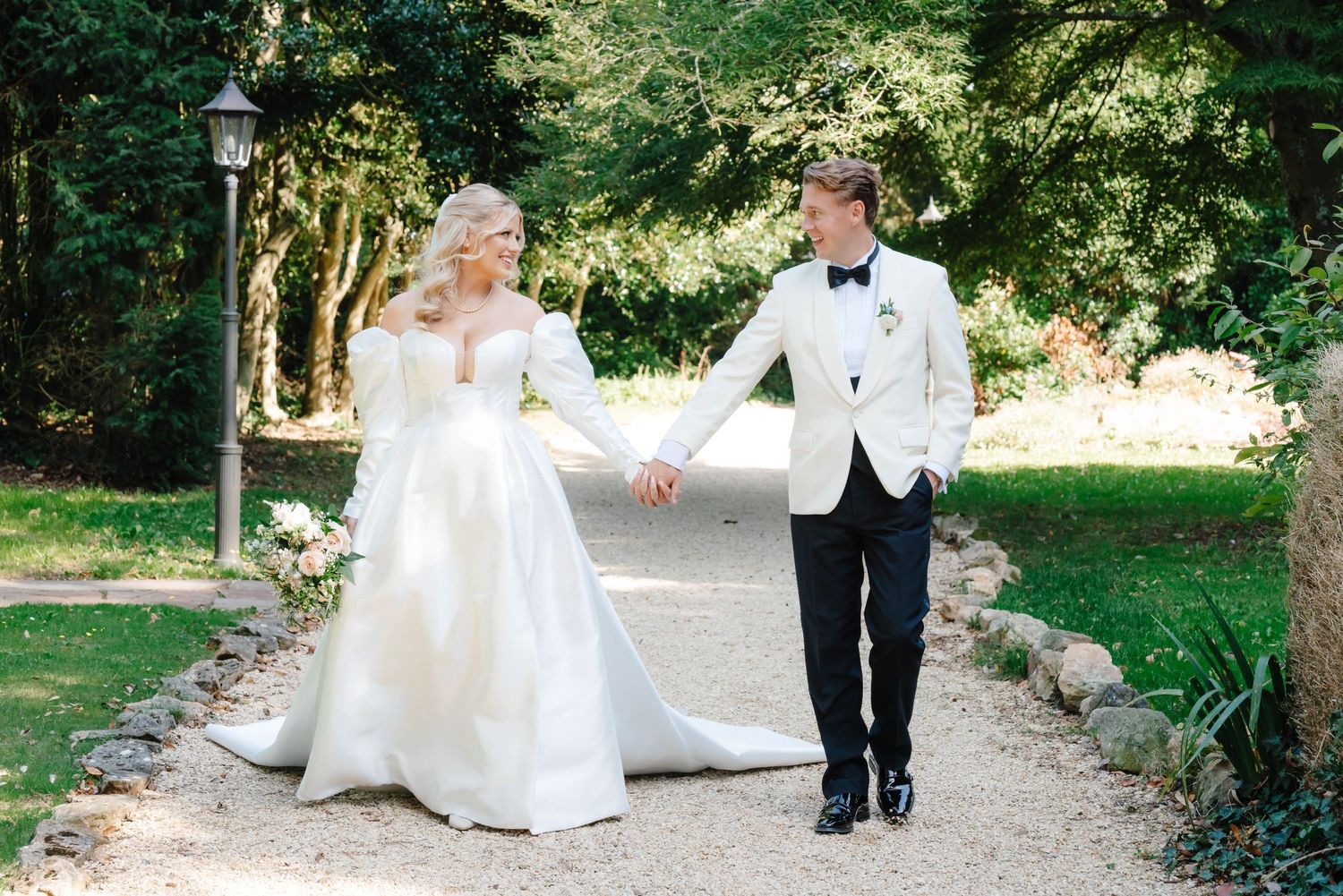 Zara Davis Wedding Photography Bristol Combe Lodge Cotswolds Cheltenham Old Down Estate couple walking