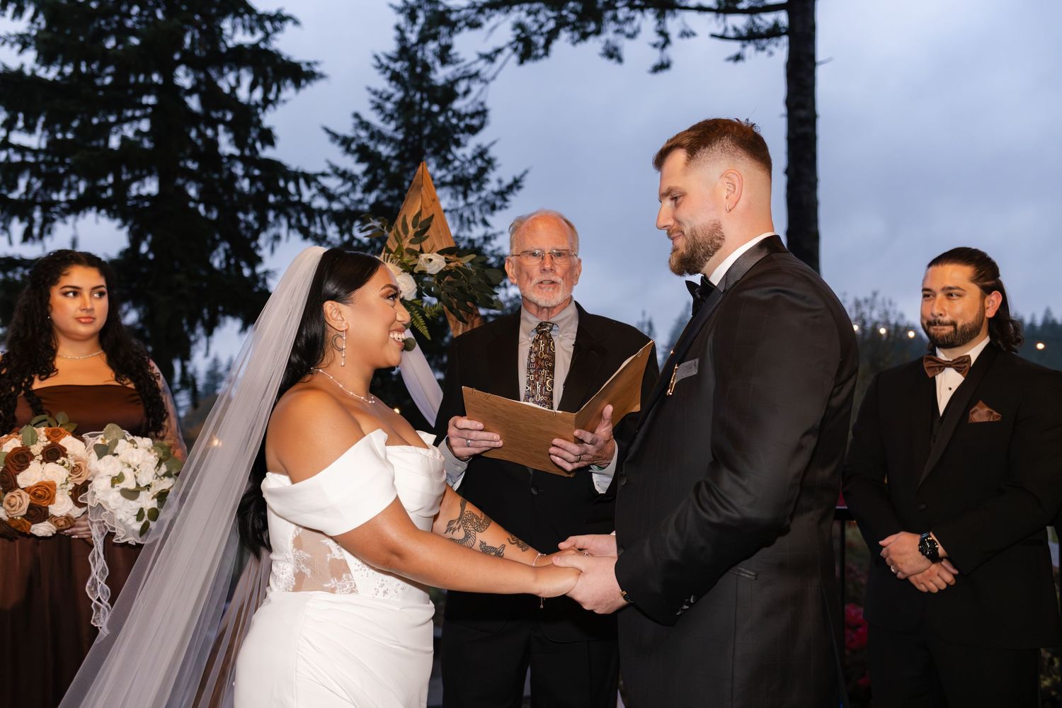 A series of wedding ceremony moments showing the couple exchanging vows with an officiant at an outdoor evening celebration.