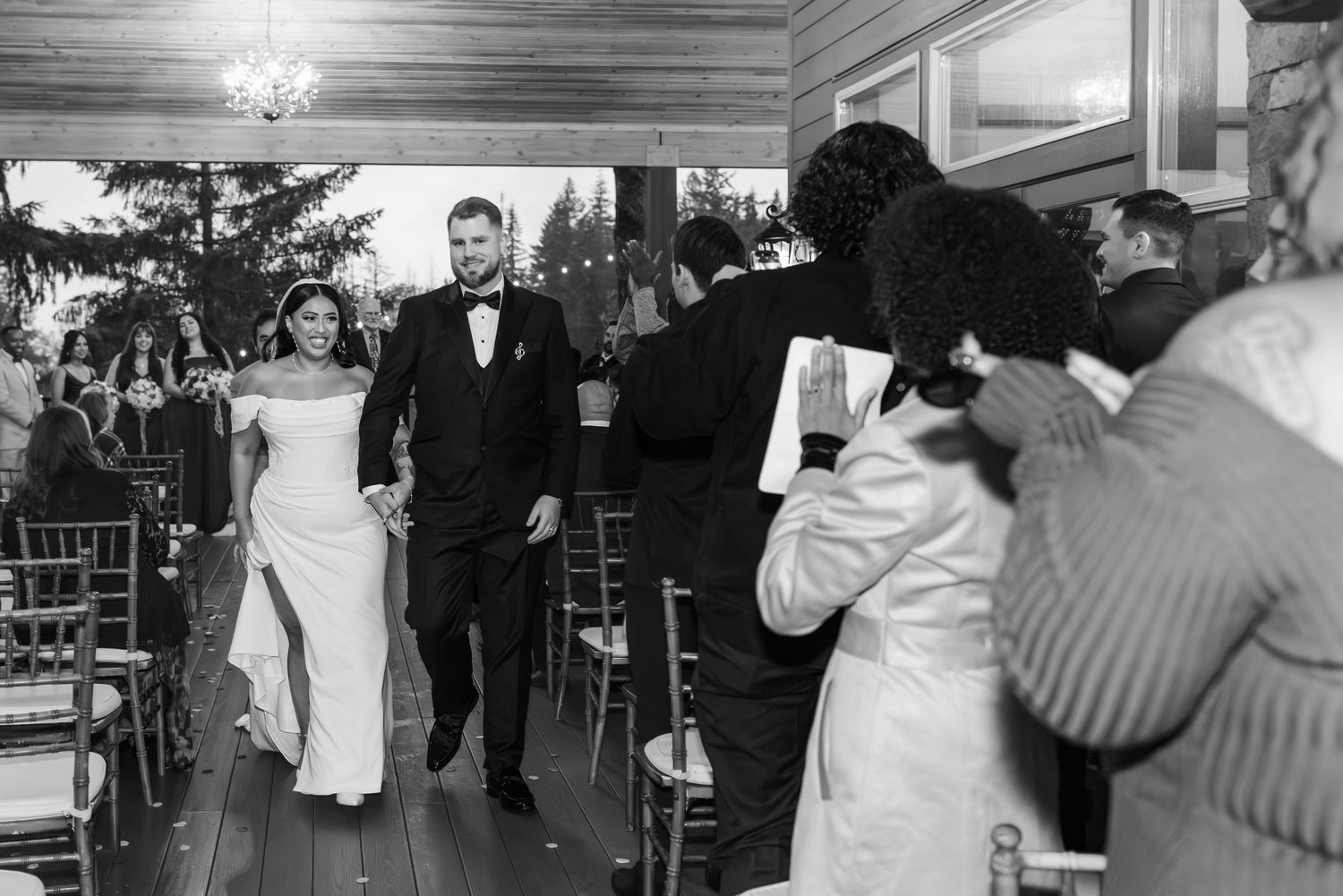 A black and white photo montage showing multiple wedding couples dancing and celebrating at their receptions.