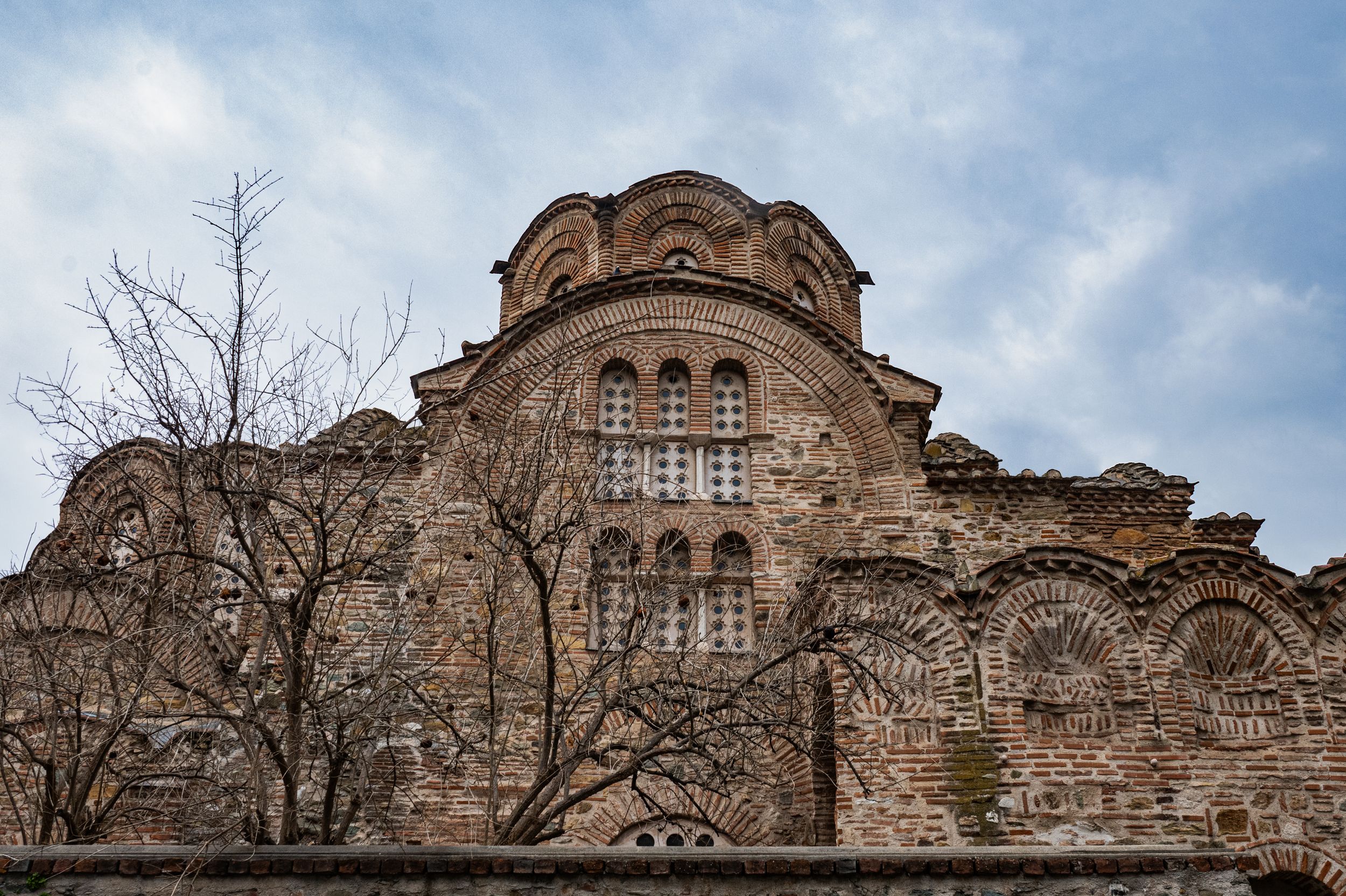 An ornate, historic Byzantine-style building with a domed roof and intricate architectural details.