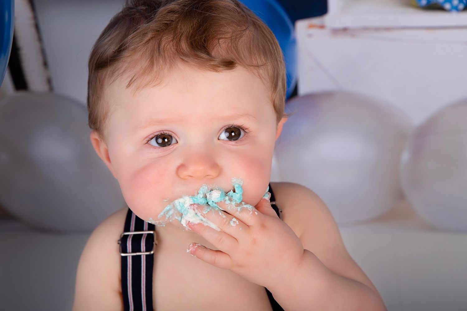 A series of images showing a baby eating with messy food on their face and hands.