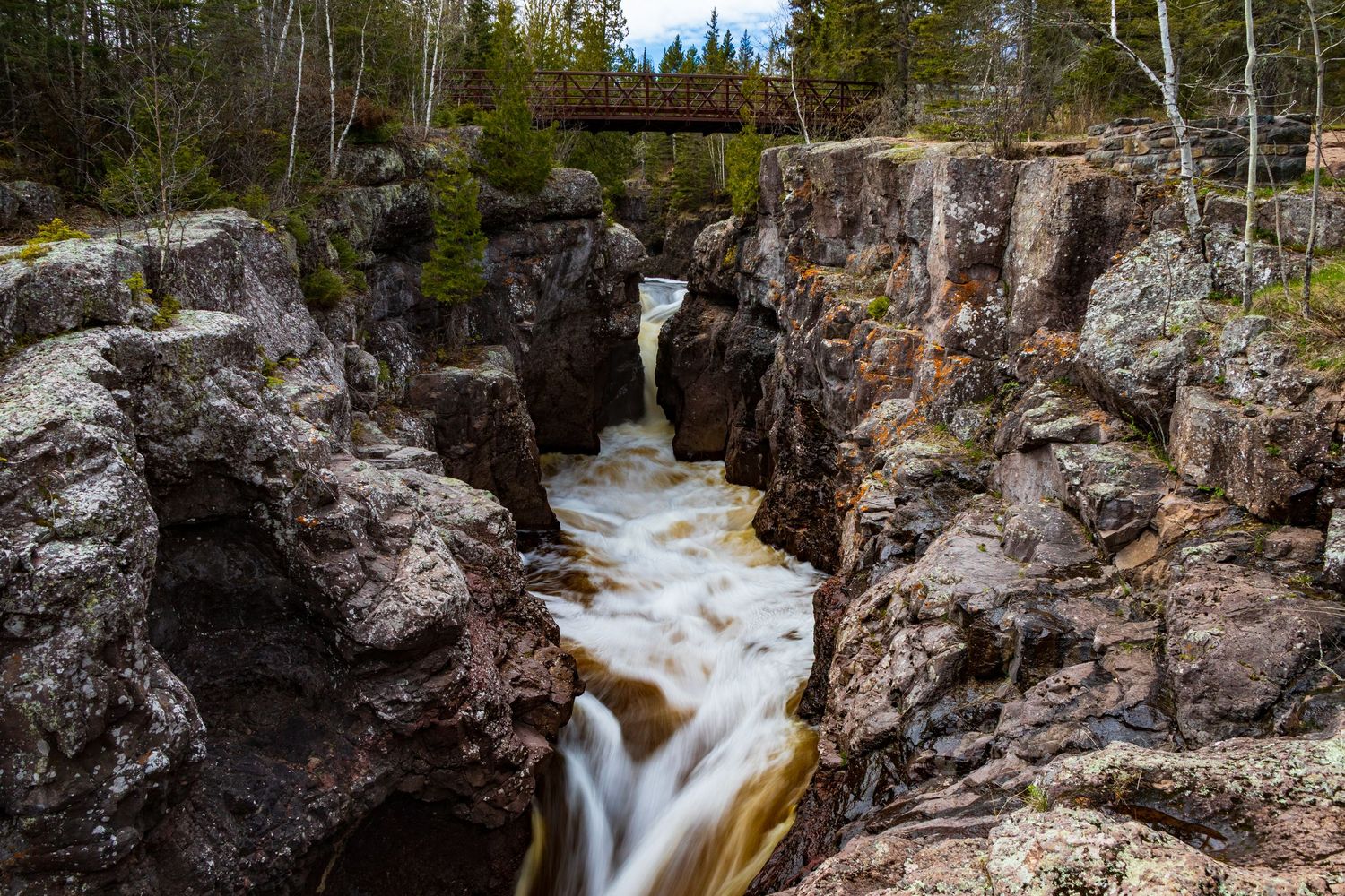 Long exposure waterfall landscape photography showing cascading water over mossy on the Temperance in forest, calming nature wall art.