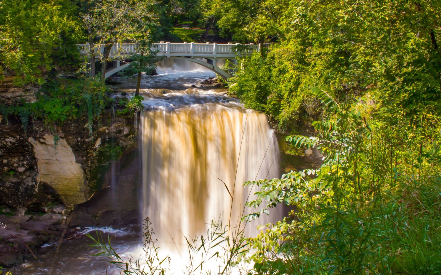 Long exposure waterfall landscape photography showing cascading water fall at Minneopa State Park in Mankato MN, calming nature wall art.