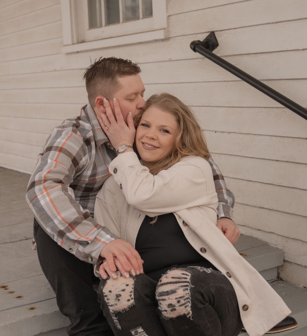 A couple shares tender moments together on a white porch in a series of romantic engagement-style photos.