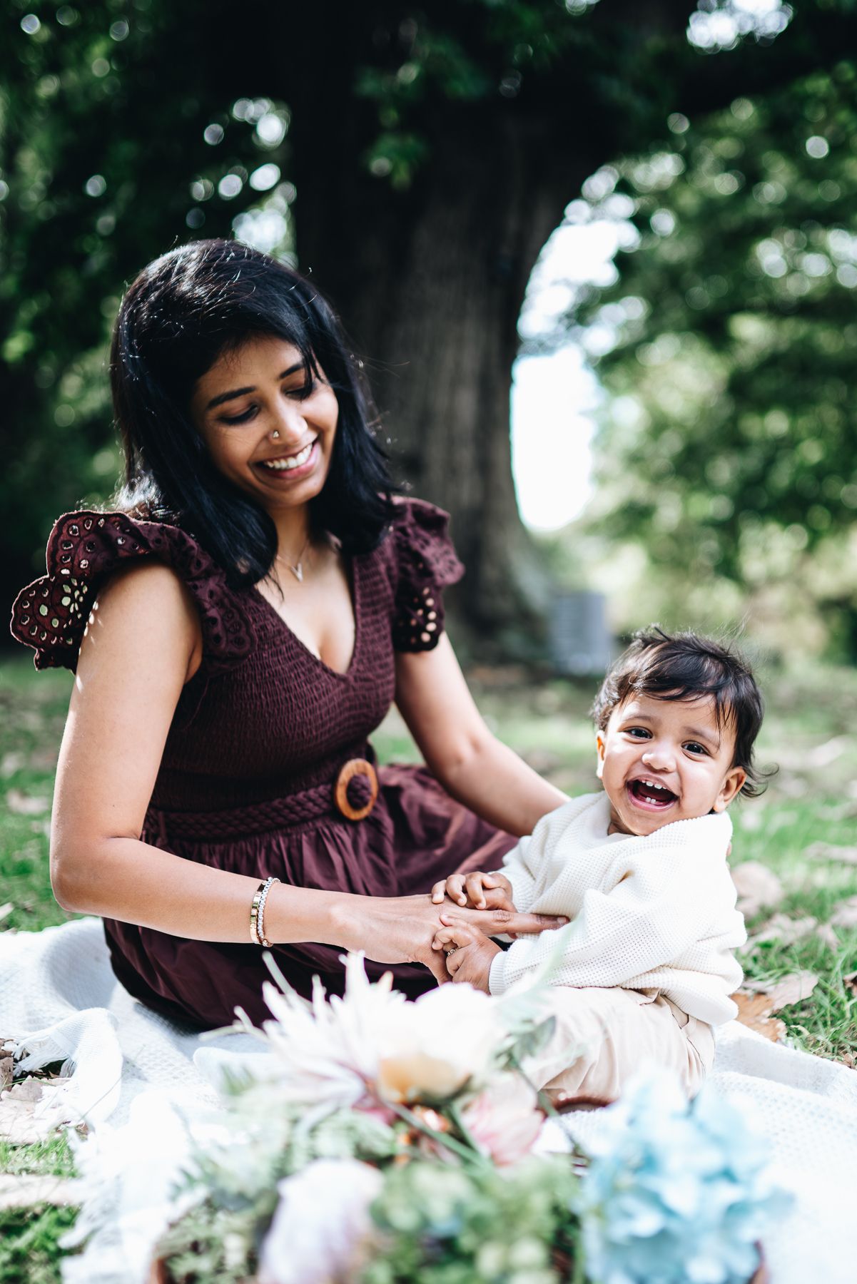 A series of candid outdoor family photos showing joyful moments between mother and son taken during Melbourne Mother's Day Mini session.