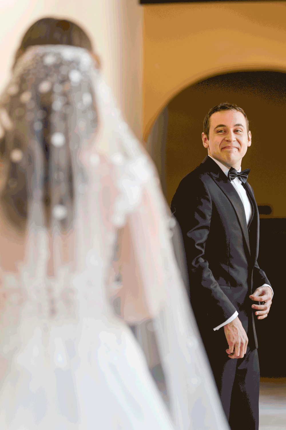 Groom seeing bride for the first time during emotional first look at Hotel El Convento