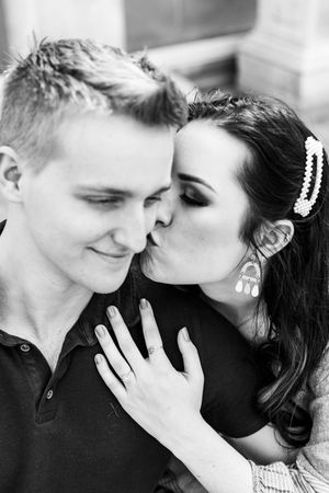 Black and white romantic photo series showing tender intimate moments between a couple in close-up.
