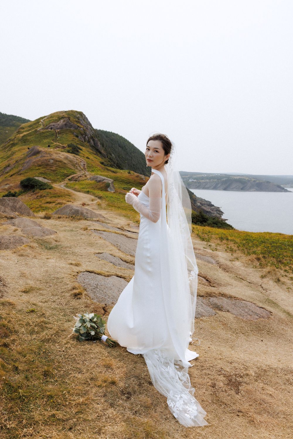 Elopement at Torbay Point captured by Newfoundland documentary style wedding photographer Kaitlyn yvette