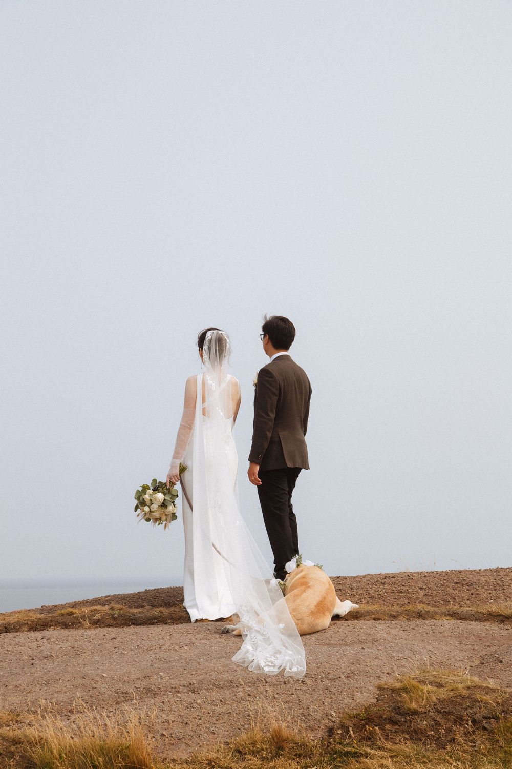 Elopement at Torbay Point captured by Newfoundland documentary style wedding photographer Kaitlyn yvette