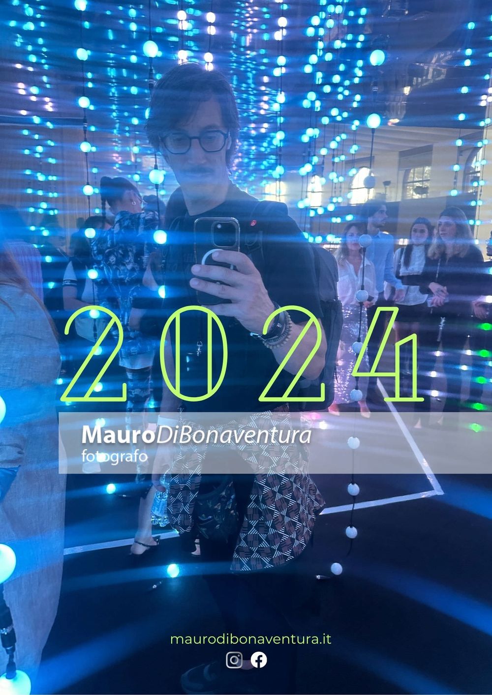 Person using phone surrounded by blue LED light installation with 2024 neon text overlay.