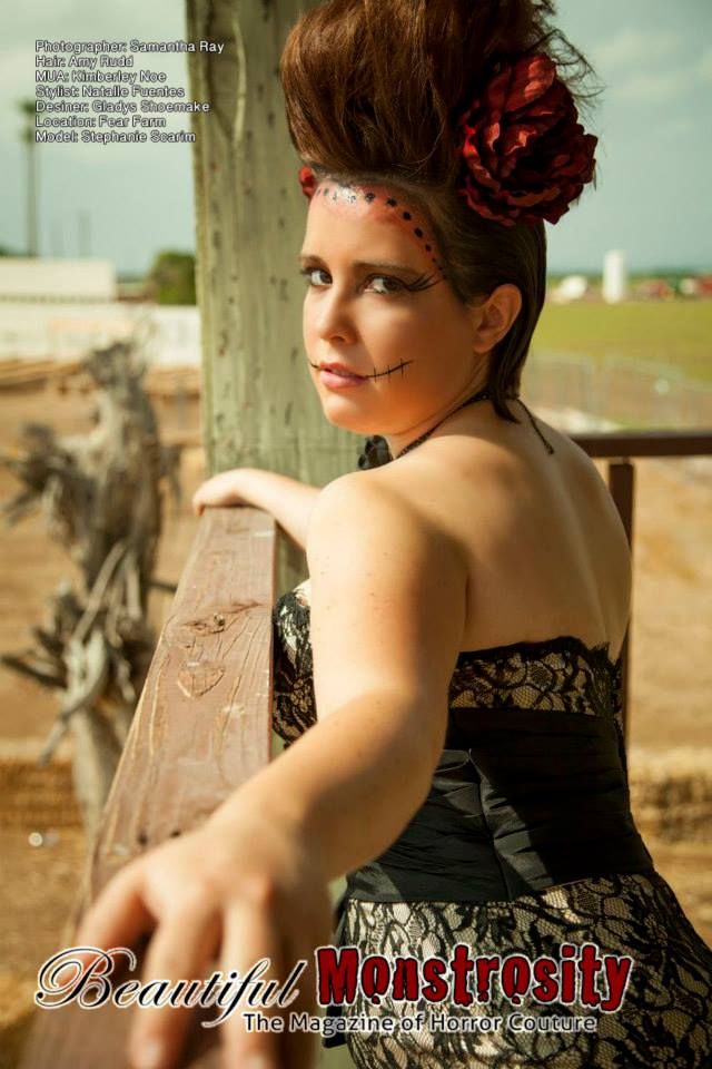 Vintage-inspired portrait with model in lace dress and elaborate updo hairstyle.
