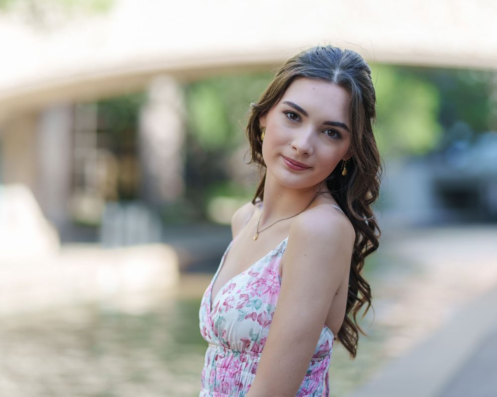 Senior photos 2025 class Los Colinas Irving Texas Mandalay Canal floral dress outfits poses ideas outdoors golden hours graduation Senior