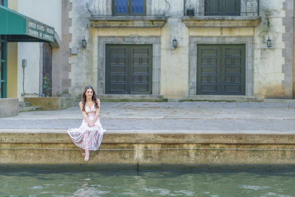 Senior photos 2025 class Los Colinas Irving Texas Mandalay Canal floral dress outfits poses ideas outdoors golden hours graduation