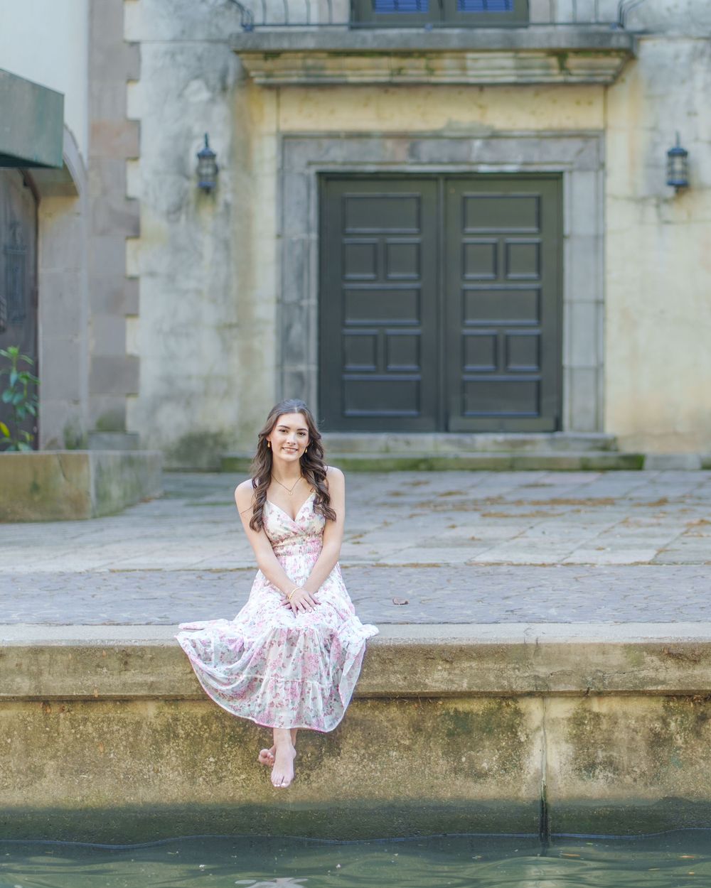 Senior photos 2025 class Los Colinas Irving Texas Mandalay Canal floral dress outfits poses ideas outdoors golden hours graduation